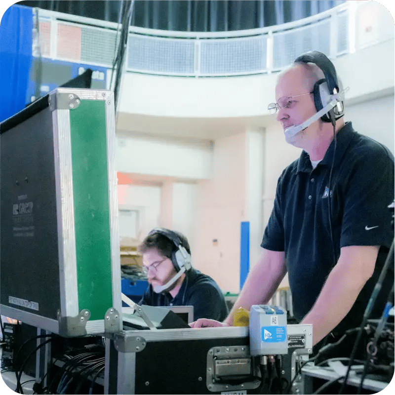 person behind event production screens